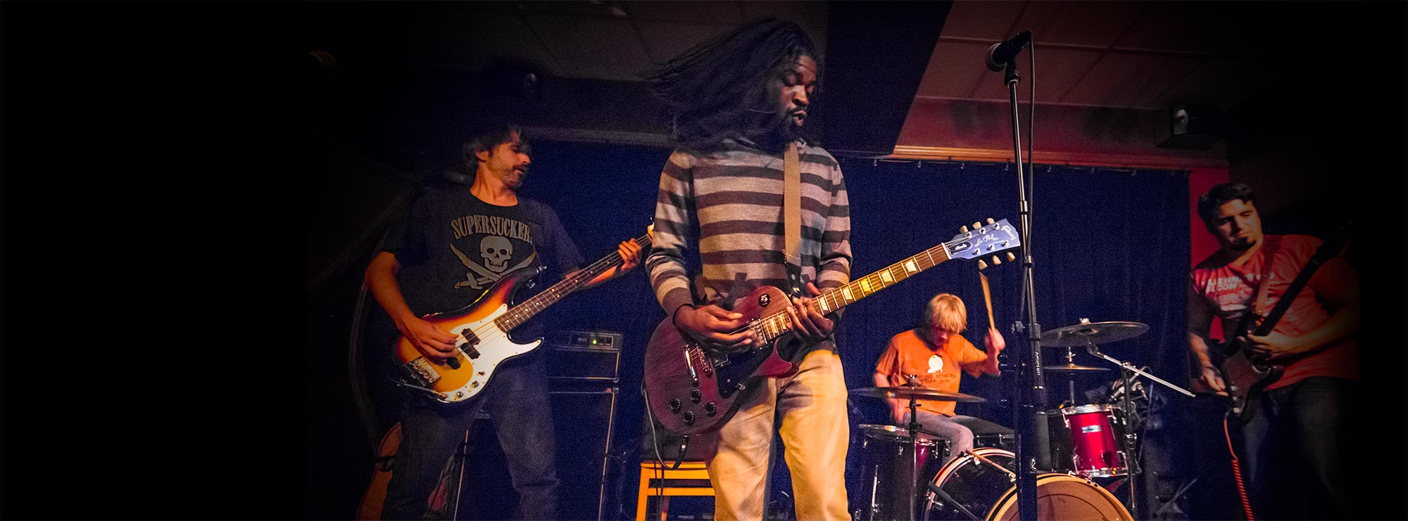 Rock band playing a live show